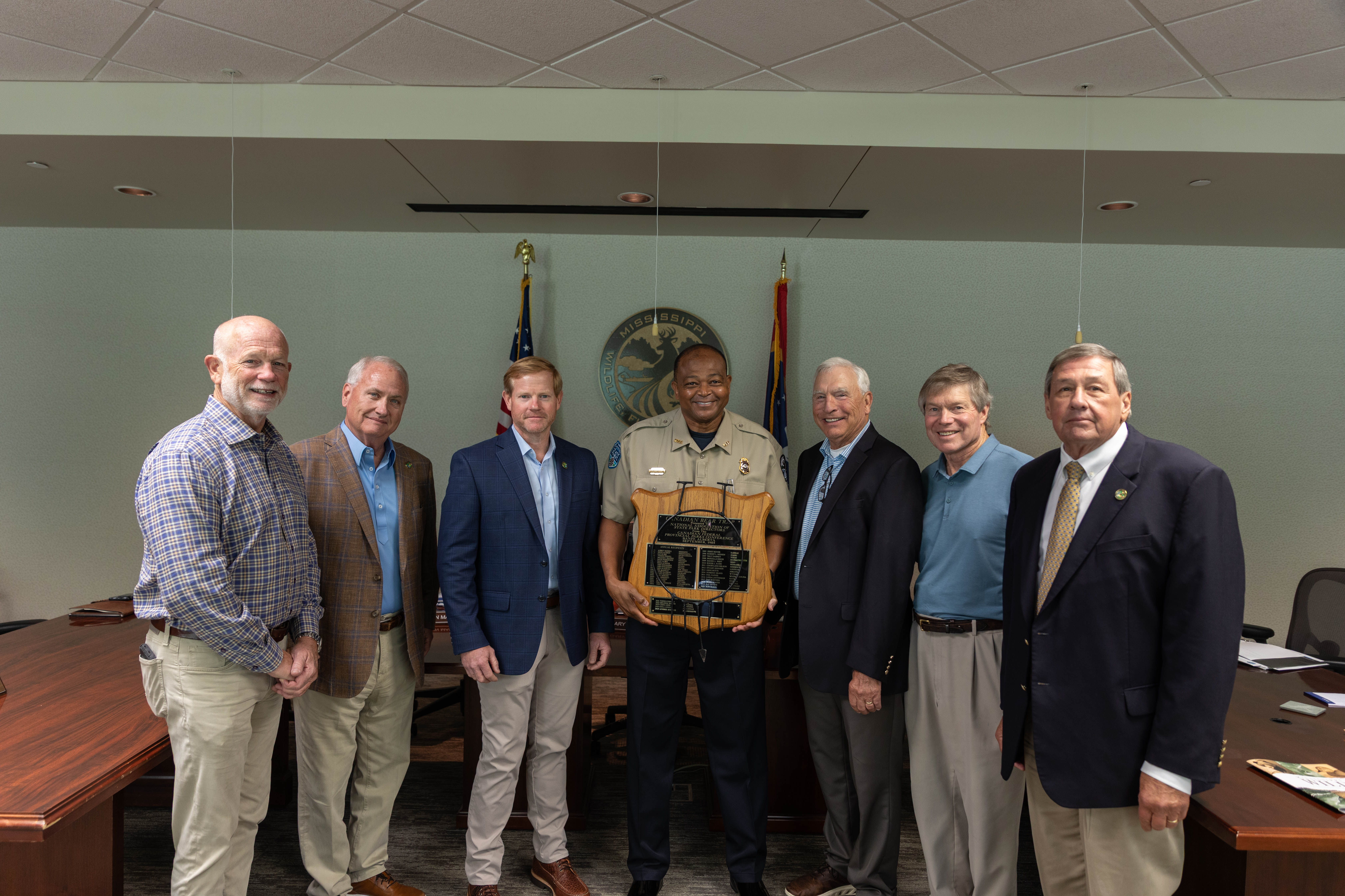 Commissioners with Andre and Canadian bear trap award